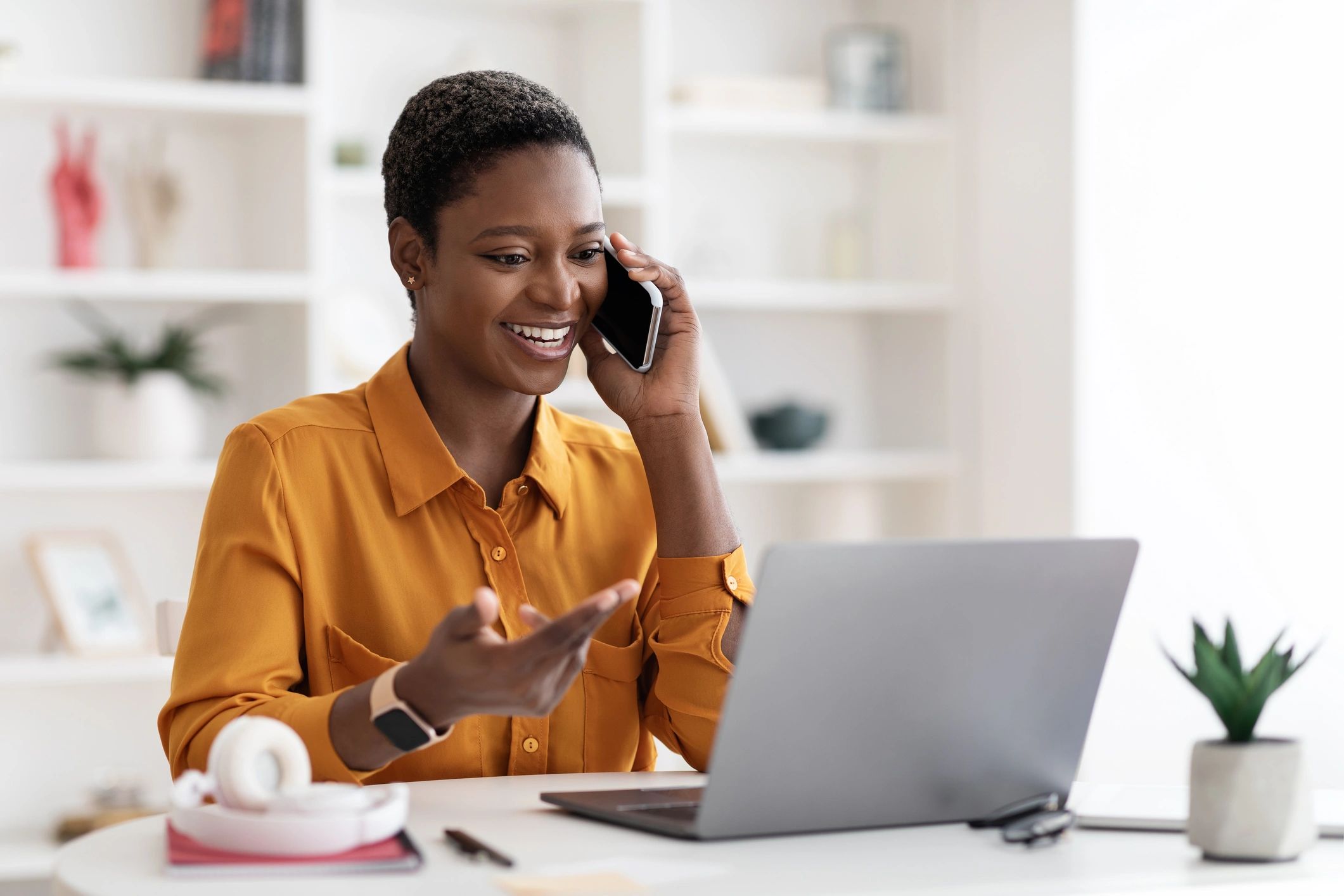 Black female professional consulting from a home office setting